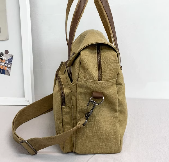 กระเป๋าสะพายผ้าแคนวาส ผู้ชาย แบบวัยรุ่น ดีไซน์เท่ มีสไตล์ มาพร้อมสายสะพาย และ หูหิ้ว ดีไซน์เก๋ 717836