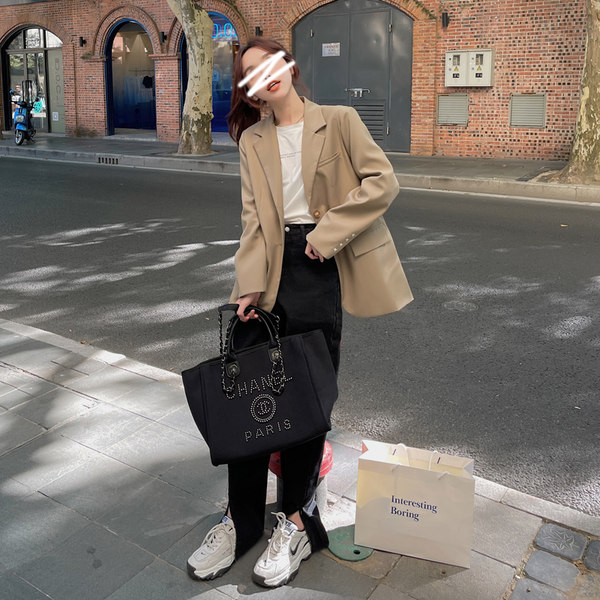 เสื้อโค้ท เสื้อโค้ทกันหนาว เสื้อโค้ทใส่เที่ยวต่างประเทศ ยี่ห้อ: Qianziqian