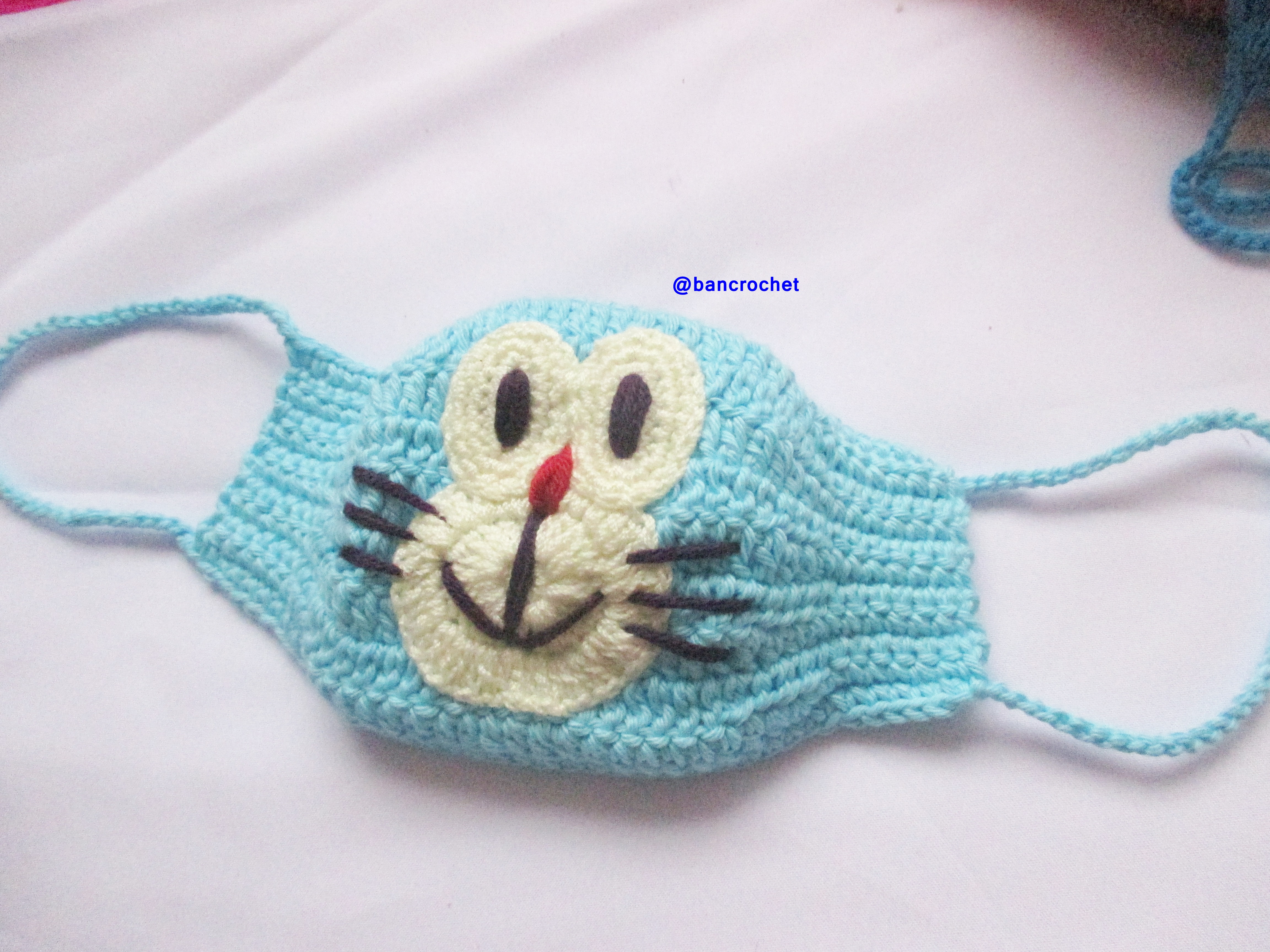 Bancrochet ผ้าปิดจมูกถักโครเชต์ ลายโดเรม่อน Crochet mask fashion หลากสี 4 นิ้ว