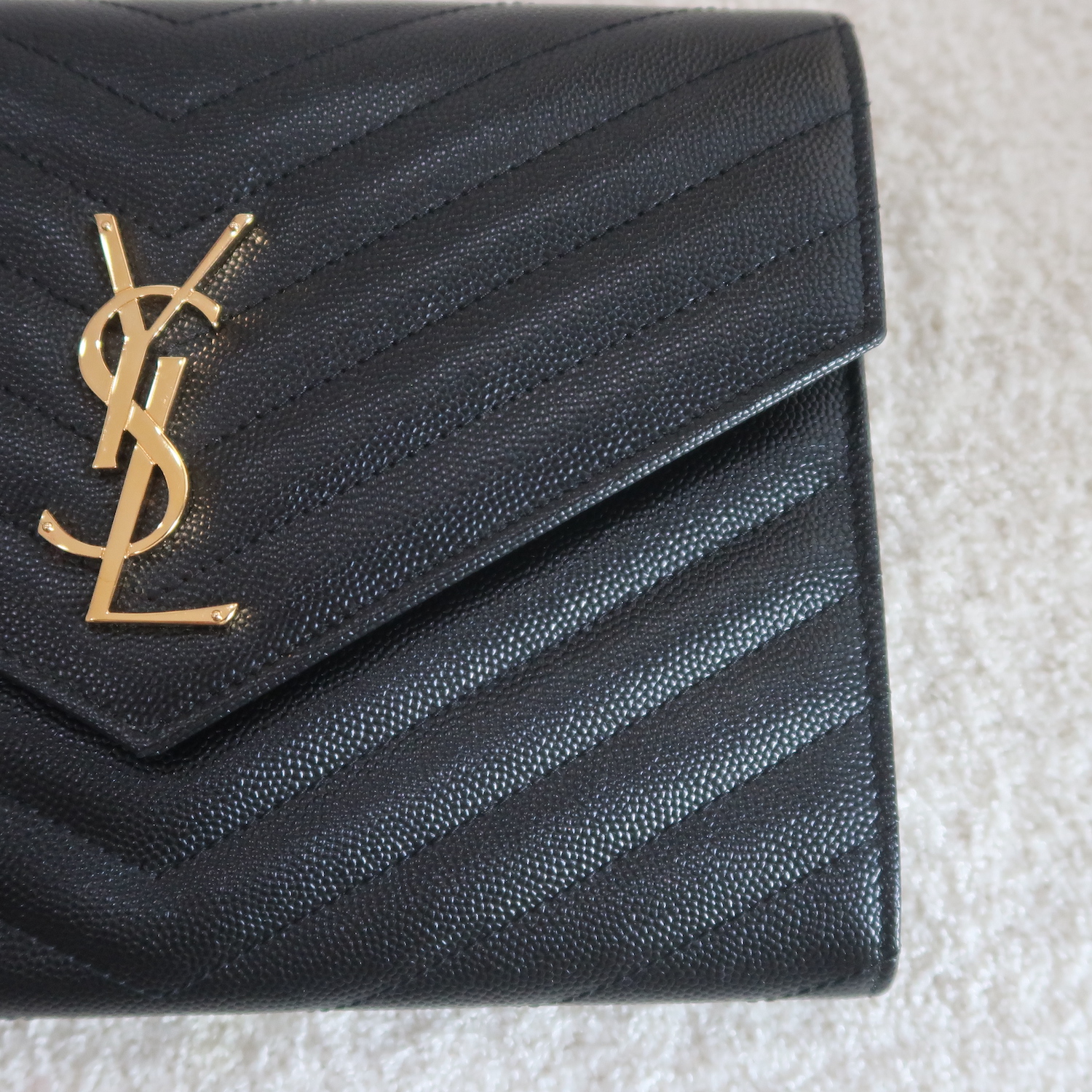 Saint Laurent Black Cassandre Matelasse Wristlet Pouch