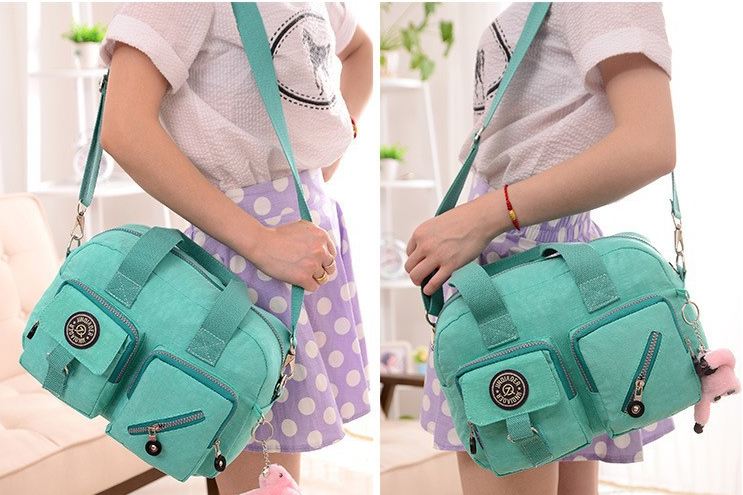 กระเป๋าสะพายข้างผู้หญิง กระเป๋าผ้าไนลอน กันน้ำ ใบใหญ่ กำลังดี ใส่ของได้เยอะ แบบสวย มีกระเป๋าหน้า 2 ช่อง ดีไซน์เก๋ มีหลายสีนะคะ 939841