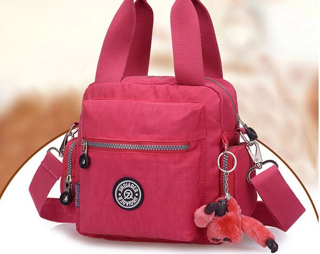 กระเป๋าถือ กระเป๋าสะพาย ผู้หญิง กระเป๋าวัยรุ่น ผ้าไนลอน กันน้ำ สีสันสดใส กระเป๋า ทรงลูกเต๋า ใส่ของได้เยอะ มีช่องแยกหลายช่อง แบบสวย ราคาถูก 817573