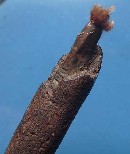 ตะกรุดพอกครั่ง