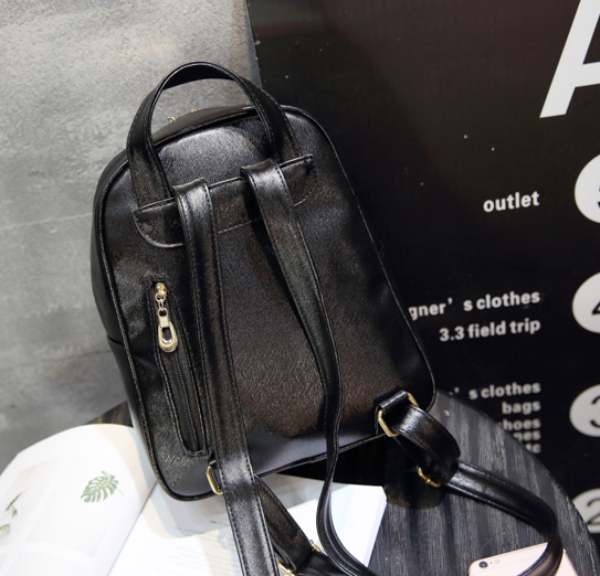 กระเป๋าเป้ หนังสีดำ แต่งลูกตาสีเหลืองน่ารัก พร้อมส่ง black