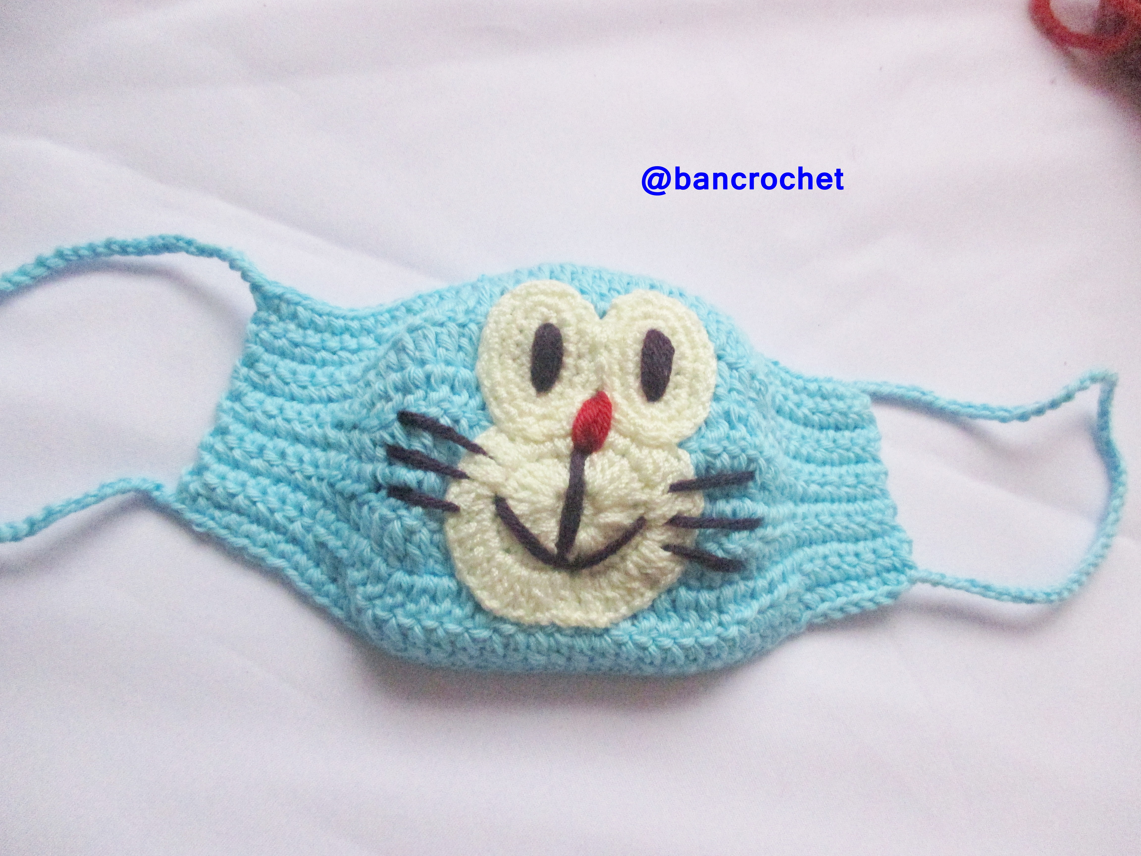 Bancrochet ผ้าปิดจมูกถักโครเชต์ ลายโดเรม่อน Crochet mask fashion หลากสี 4 นิ้ว