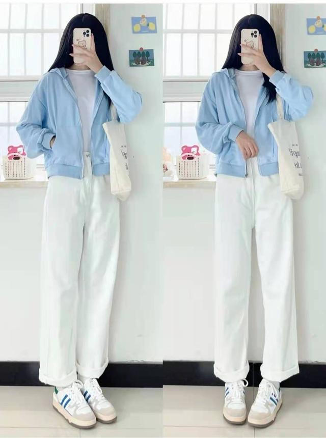 เสื้อกันหนาวสีฟ้าใส่กางเกงขายาวสีขาวเข้าคู่กับเสื้อยืดสีขาวชายเสื้อใส่ในกางเกงดูสุภาพ
