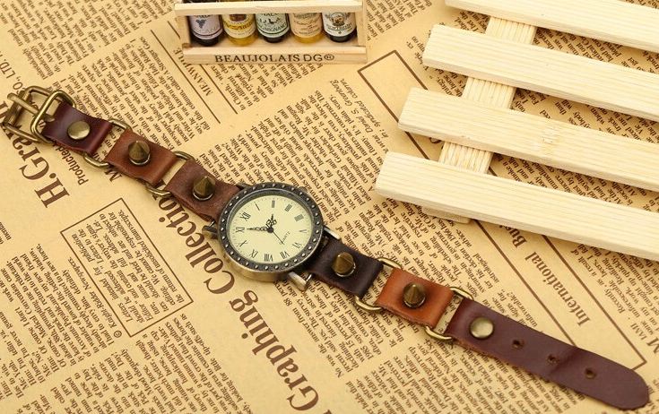 นาฬิกาข้อมือ สายหนังแท้ นาฬิกาข้อมือผู้หญิง สไตล์วินเทจ แนว ร็อค พั้งค์ ติด หมุด หนาม รอบเส้น แบบเก๋ ๆ ใส่เท่ ๆ สวยค่ะ 9009277