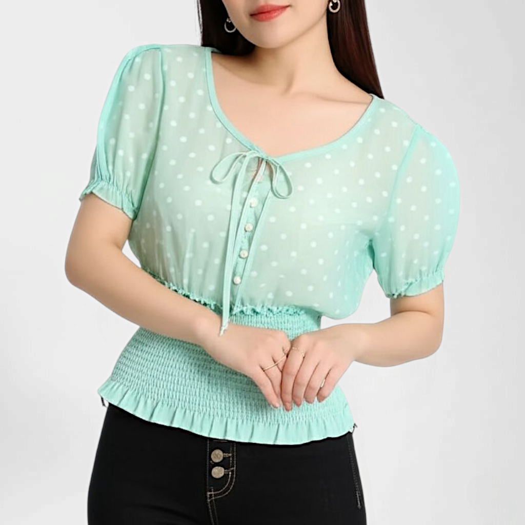 Blouse1818 เสื้อแฟชั่นแขนตุ๊กตาลายจุดสีเขียวมิ้นท์ อกแต่งกระดุมมุก เอวสม็อคยางยืดอย่างดี ผ้าใยแก้วเนื้อนุ่มใส่สบาย งานสวยแมทช์กับอะไรก็เข้า