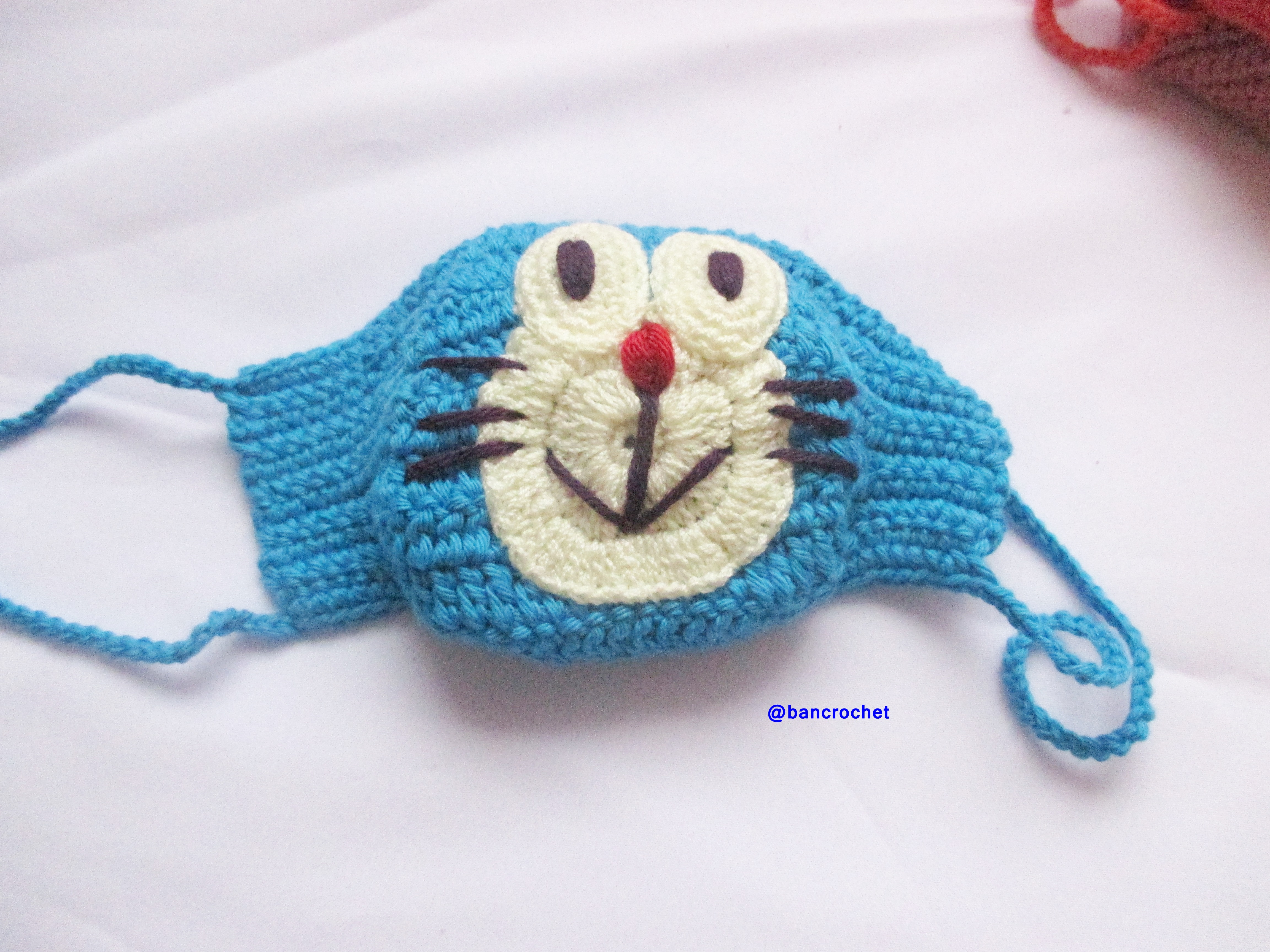 Bancrochet ผ้าปิดจมูกถักโครเชต์ ลายโดเรม่อน Crochet mask fashion หลากสี 4 นิ้ว