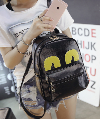 กระเป๋าเป้ หนังสีดำ แต่งลูกตาสีเหลืองน่ารัก พร้อมส่ง black