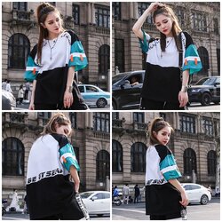 Blouse3871 เสื้อยืด Street ไซส์ใหญ่ทรงโอเวอร์ไซส์สีทูโทนขาวดำ แขนแต่งผ้าซาตินสีเขียวเพิ่มดีเทลความสวยเท่ ผ้าคอตตอนซอฟท์เนื้อนุ่มใส่สบายยืดหยุ่น แมทช์ง่ายใส่กับขาสั้นหรือขายาวก็ดูดีไม่แพ้กัน